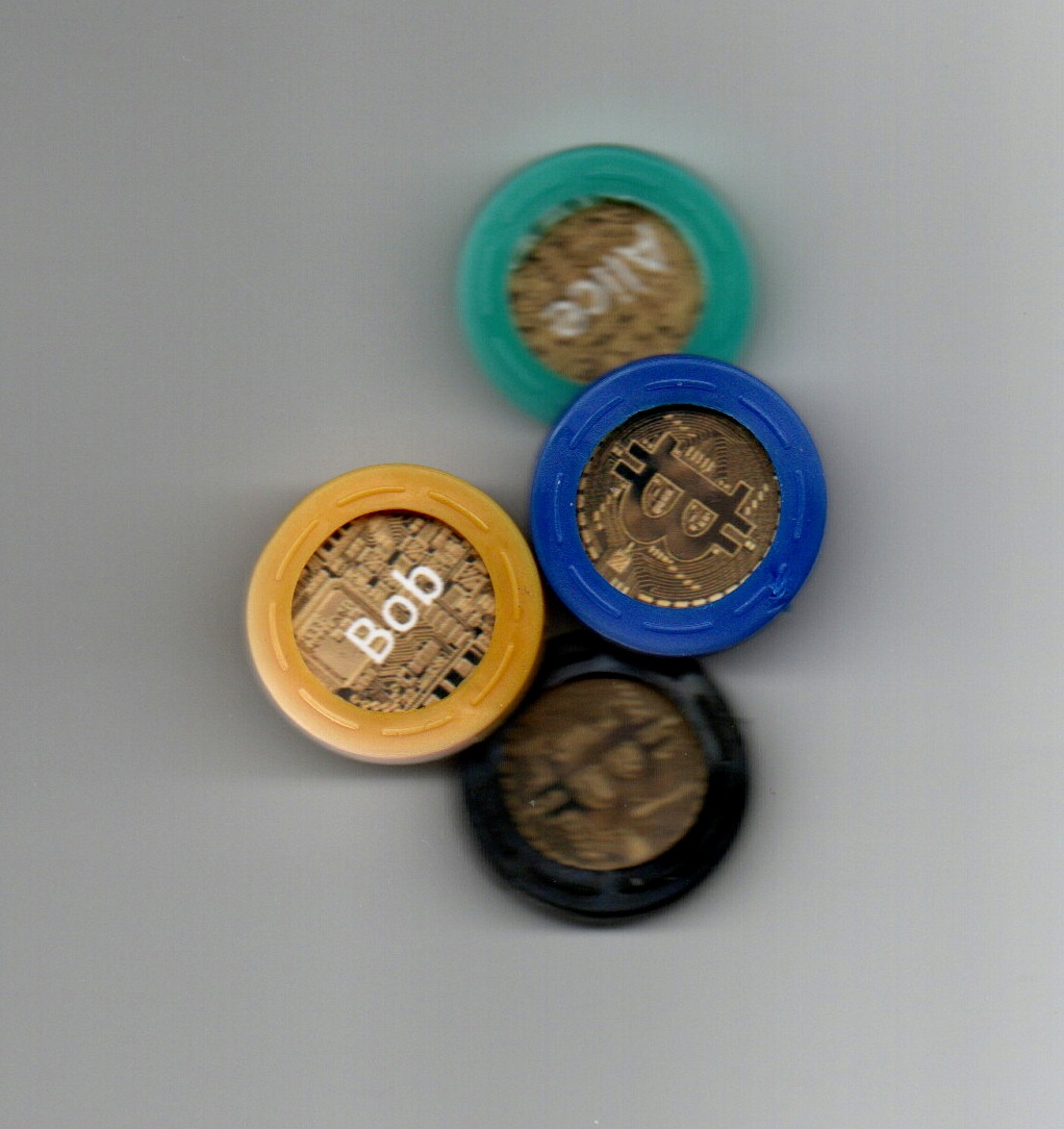 Peças dos jogadores - moedas Bitcoin físicas